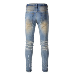 Purple jeans Men's Blue Jeans with Black Patches, Distressed Paint, and Ripped Details (523-6523)